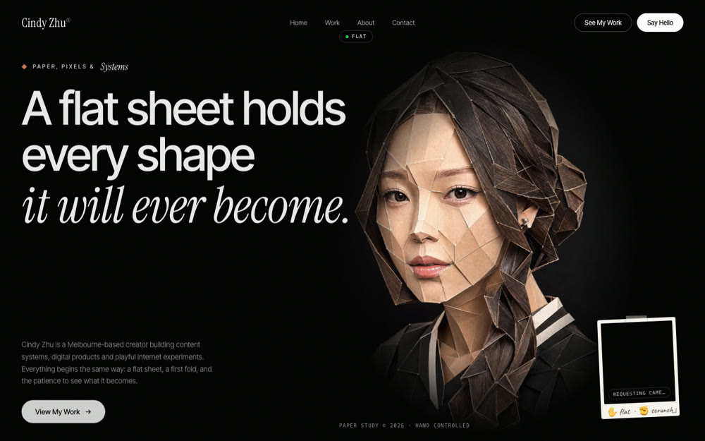 A black portfolio page with a papercraft portrait that crumples when you close your hand on webcam