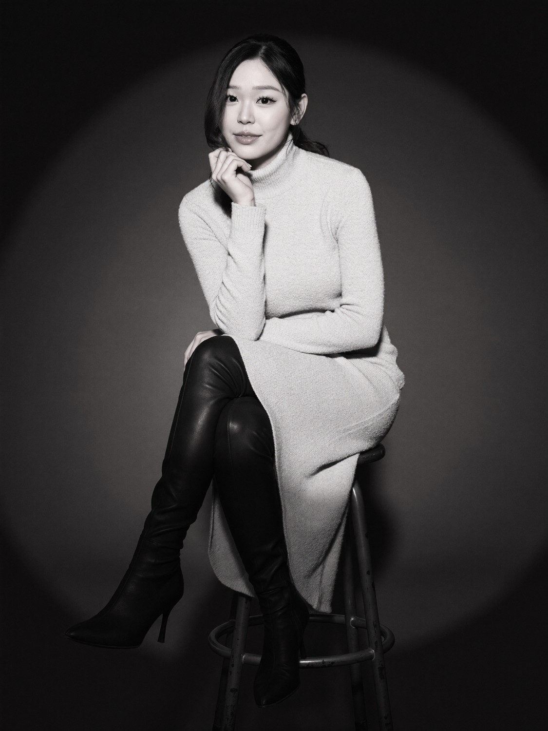 Cindy's generated portrait: Black-and-white spotlight on the stool